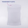 Bildet viser et klart, gjennomsiktig plastdeksel med en avrundet topp. Det har en etikett som peker til det og som lyder 'TRANSPARENT PLAST.'