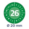 Bildet viser en rund skive markert med tall fra 1 til 12, med tallet 26 fremtredende i sentrum. Under skiven er det en merknad som indikerer en diameter på 20 mm, satt mot en grønn bakgrunn.