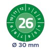 Bildet viser en rund måler med grønn bakgrunn. Tallet 26 er fremtredende plassert i midten, omgitt av tallene fra 1 til 12 og 1 til 12 i et sirkulært mønster. Under sirkelen angis en diameter på 30 mm.
